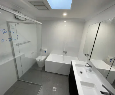 A freshly remodelled bathroom by our team, featuring contemporary design elements and high-quality finishes